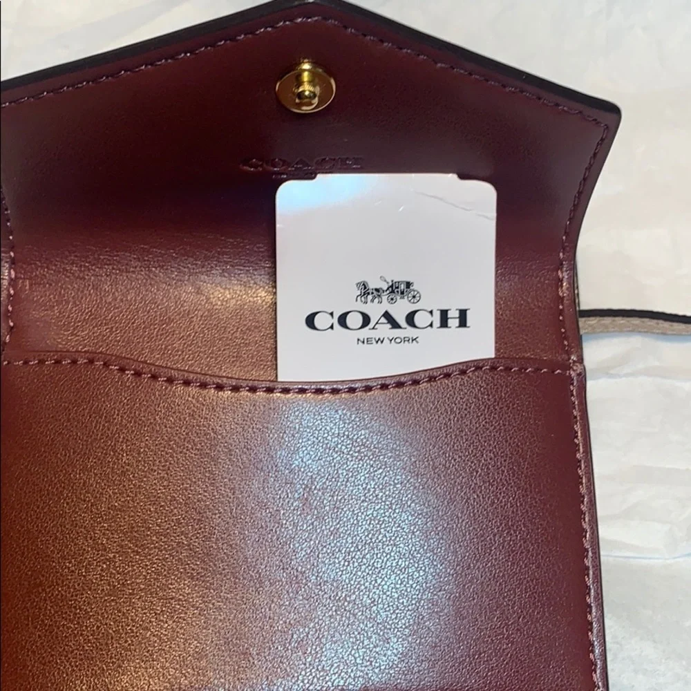 NWT Coach limited edition leashed wallet w/mirror